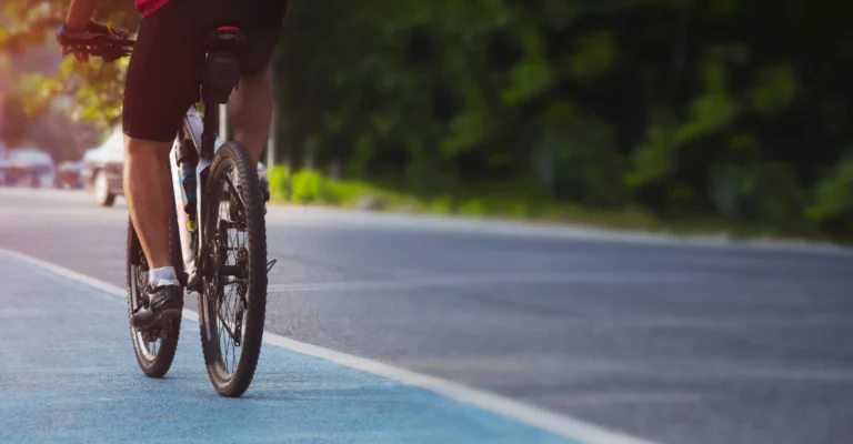 Close-up of a bicycle wheel on the road