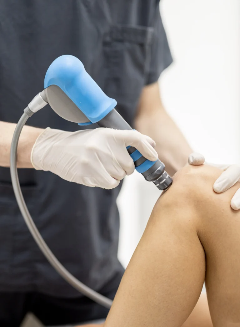 Therapy device being used on a patient's knee